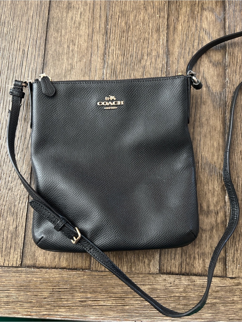 Coach Black Leather Crossbody Bag with Gold Logo and Zipper